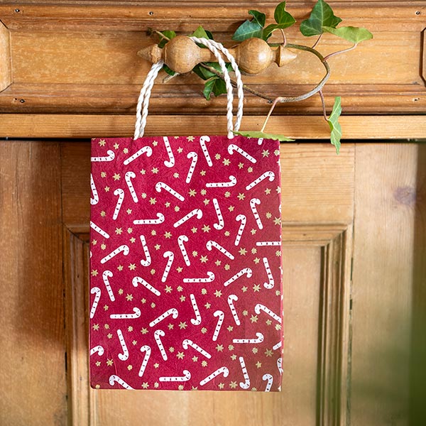 Geschenktüte S ZUCKERSTANGE, beere-natur, Loktapapier / CONTIGO Fairtrade Onlineshop